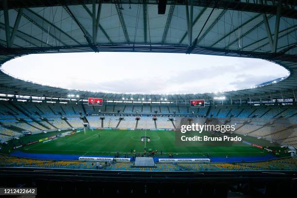 General view as players warm up in an empty stadium prior to a match between Flamengo and Potuguesa as part of the Rio State Championship 2020, to...