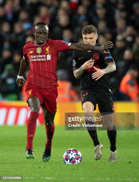 Sadio Mane of Liverpool and Kieran Trippier of Atletico Madrid during the UEFA Champions League round of 16 second leg match between Liverpool FC and...