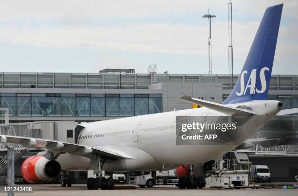 View of a SAS Airbus 330 parked at a gate of Arlanda's airport in Sweden on August 16, 2011. The SAS flight bound for Chicago was cancelled today...