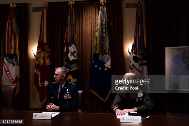 General John Hyten, Vice Chairman of the Joint Chiefs of Staff and General David Berger, Commandant of the United States Marine Corps, listen a...