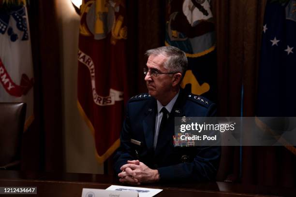 General John Hyten, Vice Chairman of the Joint Chiefs of Staff, listens during a meeting between President Donald Trump, Senior Military Leadership...