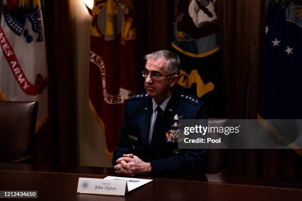 General John Hyten, Vice Chairman of the Joint Chiefs of Staff, listens during a meeting between President Donald Trump, Senior Military Leadership...