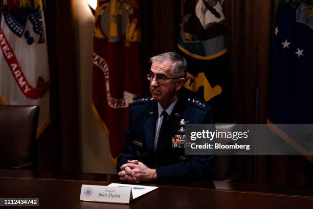 General John Hyten, vice chairman of the joint chiefs of staff, listens during a meeting with U.S. President Donald Trump, senior military leadership...