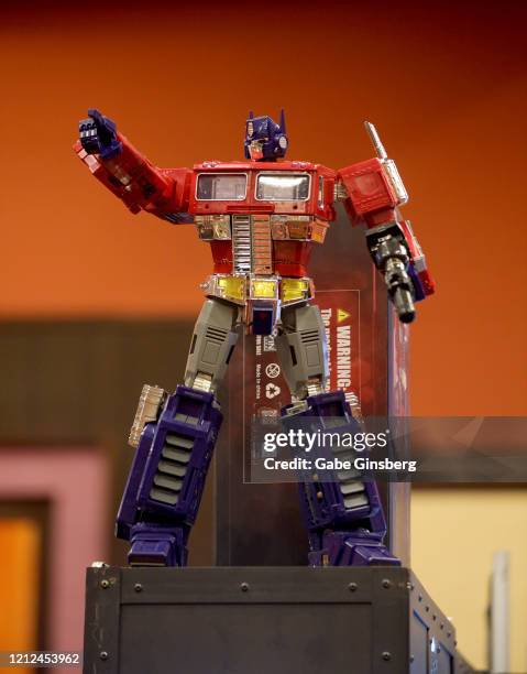 Lewin Resources Atlas figure of the character Optimus Prime from the "Transformers" movie franchise is displayed in The Chosen Prime booth during...