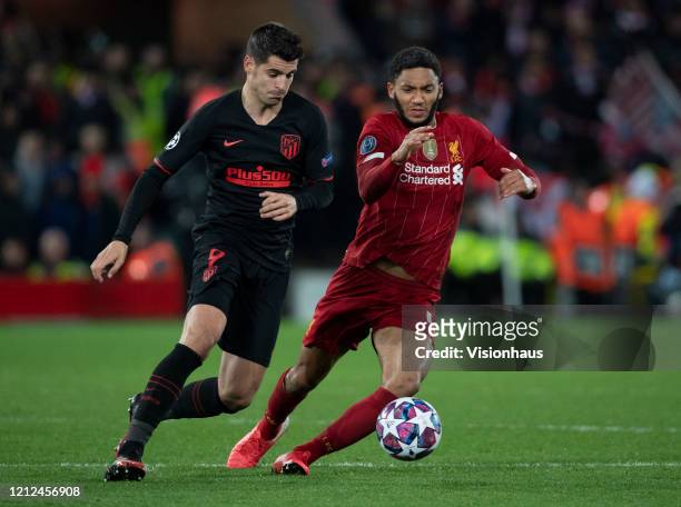 Joe Gomez of Liverpool and Álvaro Morata of Atletico Madrid during the UEFA Champions League round of 16 second leg match between Liverpool FC and...