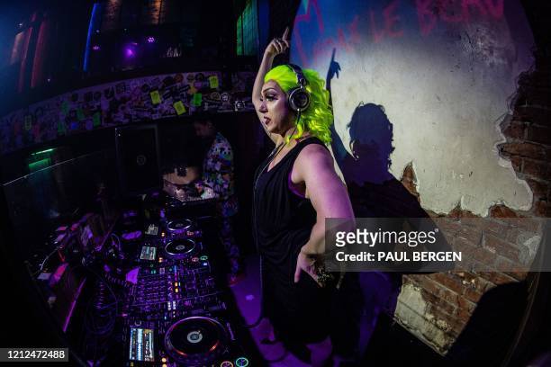 Dutch drag queen, actor, performer and DJ Hoax Lebeau aka Joost Gimbel performs via a video live stream at empty Club NYX in Amsterdam, The...