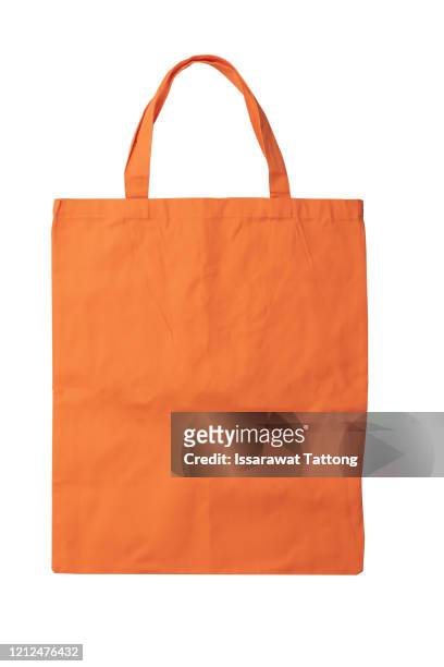 orange eco bags, eco cloth bags to reduce global warming, shopping bags eco burlap, woven fabric recycling bag violet orange, - tragetasche oder tragebeutel stock-fotos und bilder