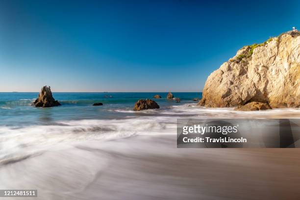 perfect cloudless day at el matador beach - malibu stock pictures, royalty-free photos & images