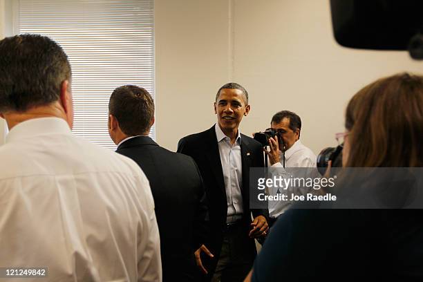 President Barack Obama meets with community leaders and business owners during a round table discussion at the Rural Economic Forum at Northeast Iowa...