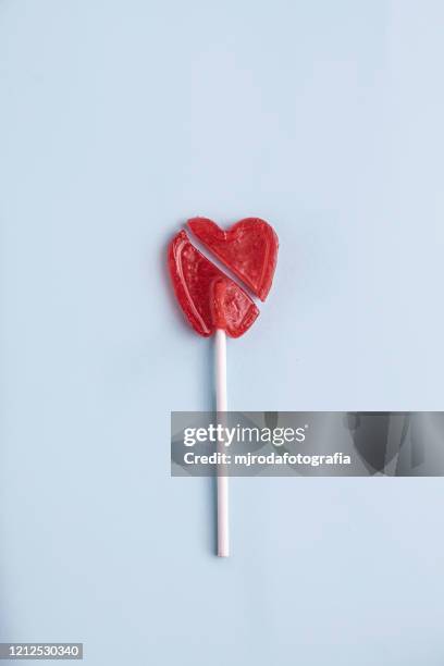 break heart - lollipop stock pictures, royalty-free photos & images