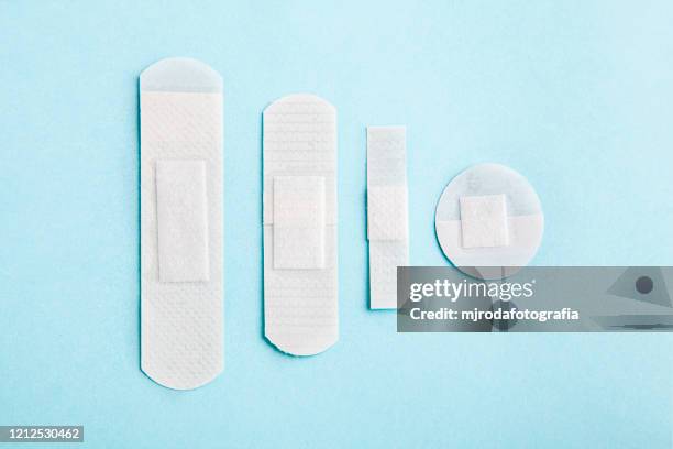 adhesive bandage set - sticky stock pictures, royalty-free photos & images