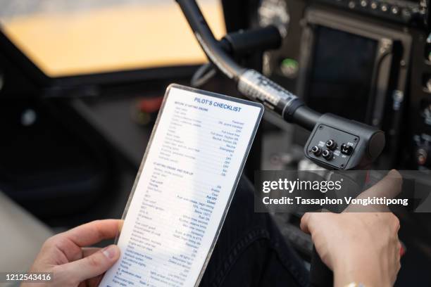 Pilot Using Checklist 20 Pilot Cockpit Checklist Stock Photos, High-Res Pictures, and Images ...