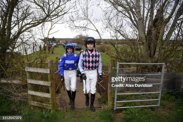 Jockeys make their way out to the paddock during Point-to-Point Racing at High Easter on March 15, 2020 in Chelmsford, England.