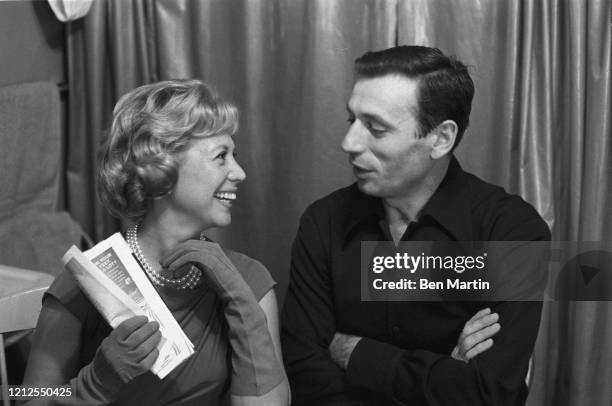Yves Montand , Italian-French actor and singer backstage with singer Dinah Shore during his Broadway run of "An Evening With Yves Montand", October...