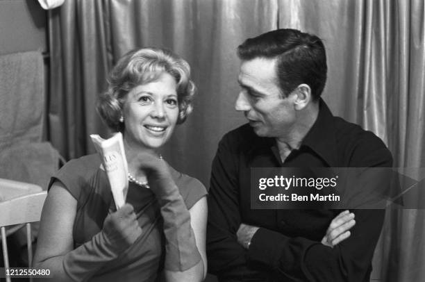 Yves Montand , Italian-French actor and singer backstage with singer Dinah Shore during his Broadway run of "An Evening With Yves Montand," October...