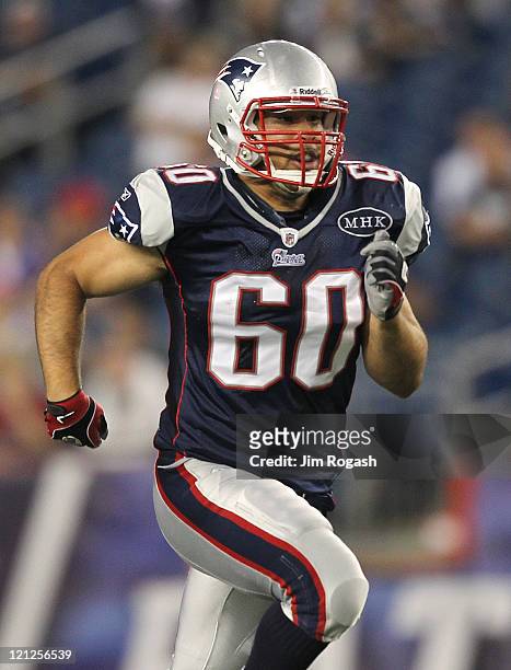 Rich Ohrnberger of the New England Patriots competes during a game against the Jacksonville Jaguars at Gillette Stadium on August 11, 2011 in...