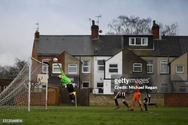 Goalkeeper makes a save during Sunday league football between Syston Brookside FC and Shepshed Oaks FC on March 15, 2020 in Leicester, England.