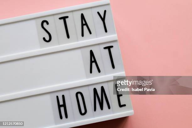 "STAY AT HOME" hashtag in light box