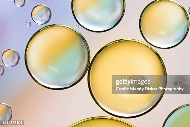 oil and water abstract - oil drop stock pictures, royalty-free photos & images