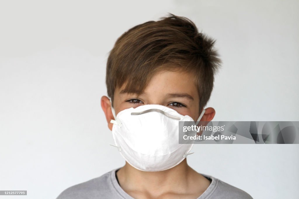 Portrait of boy wearing a face mask