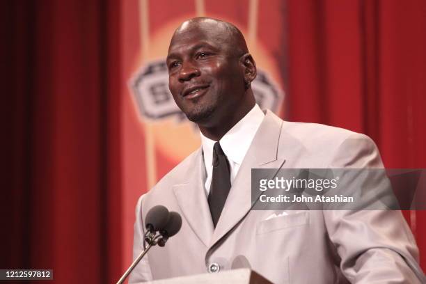 Michael Jordan is shown speaking at the podium during his acceptance speech at the Hall of Fame Enshrinement in Springfield, Massachusetts on...