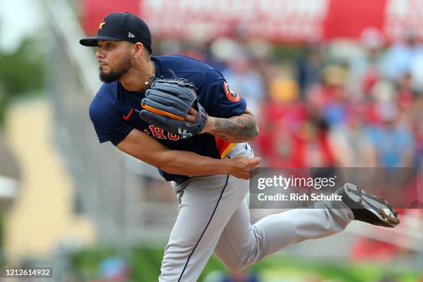 Roberto Osuna of the Houston Astros in action against the St. Louis Cardinals during a spring training baseball game at Roger Dean Chevrolet Stadium...