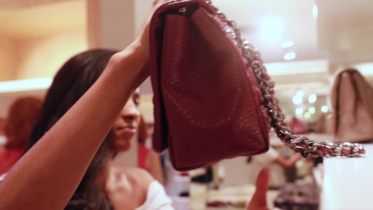 https://media.gettyimages.com/id/1212617890/video/girl-choosing-bag-at-store.jpg?b=1&s=640x640&k=20&c=VRSNYOtxmav9WXGWwzzdMmfCOweX2lsMDKEgD6Ajjx8=