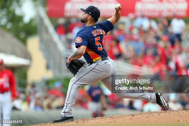 Roberto Osuna of the Houston Astros in action against the St. Louis Cardinals during a spring training baseball game at Roger Dean Chevrolet Stadium...