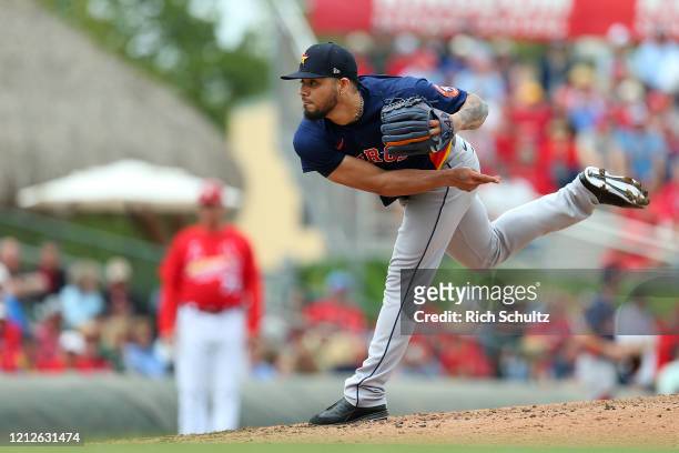 Roberto Osuna of the Houston Astros in action against the St. Louis Cardinals during a spring training baseball game at Roger Dean Chevrolet Stadium...