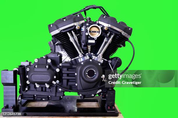 engine of motorcycle in the green backgrounds. - piston stock pictures, royalty-free photos & images