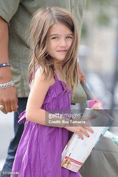 Suri Cruise enters her photo shoot at Fast Ashleys Studio on August 16, 2011 in New York City.