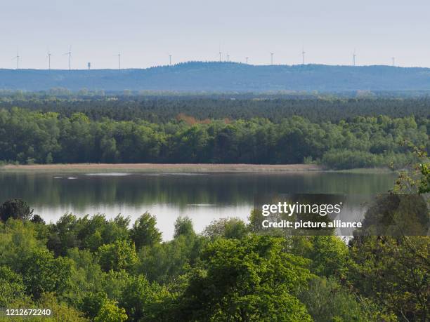 May 2020, Brandenburg, Am Mellensee: View from the observation tower near the former Sperenberg gypsum quarries to the Krumme See. A circular hiking...