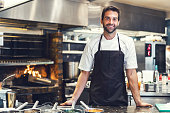 Confident male chef in commercial kitchen