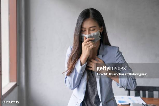 illness from working - symptom stock pictures, royalty-free photos & images