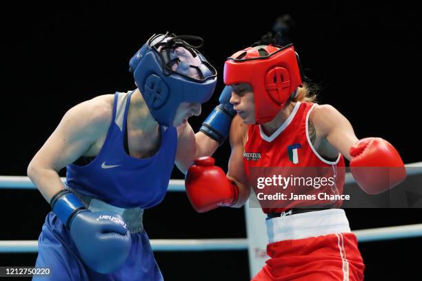 Anush Grigoryan of Armenia punches Giordana Sorrentino of Italy in their Women's Flyweight 48-51KG Preliminary round bout on Day Three of the Road to...