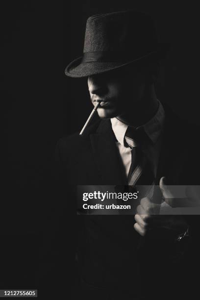 retro man in hat wears suit and tie - roaring 20s stock pictures, royalty-free photos & images