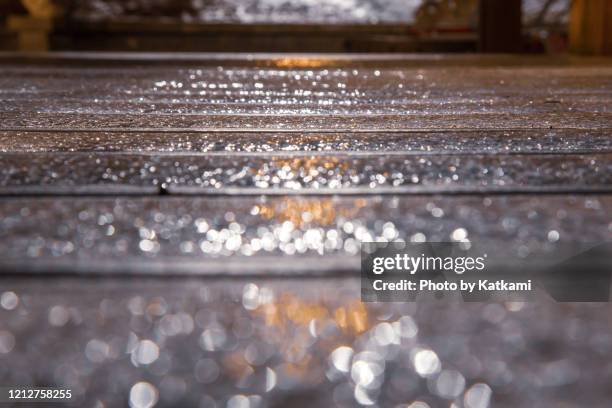 composite decking covered in ice - hal bildbanksfoton och bilder