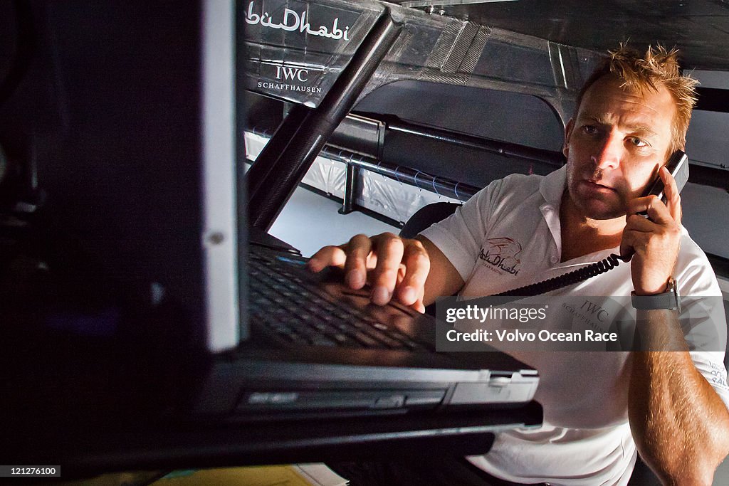 Abu Dhabi Ocean Racing navigator Jules Salter below decks at the navigation station during training