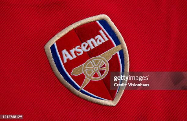 The Arsenal FC club crest on their shirt on March 16, 2020 in Manchester, England.