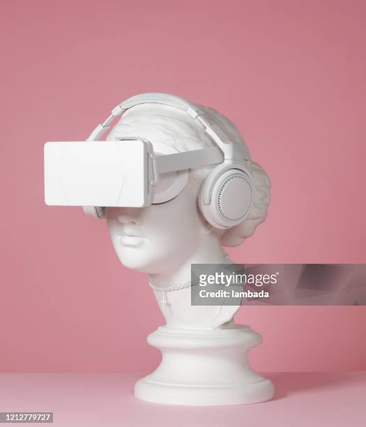 greek goddess wearing headphones and vr headset - statue stock pictures, royalty-free photos & images