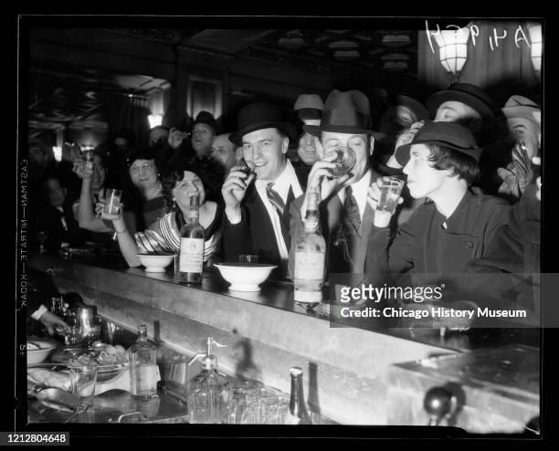 Patrons drinking during the repeal of prohibition at Hotel Brevoort's world famous Crystal Bar, Chicago, Illinois, December 1933.