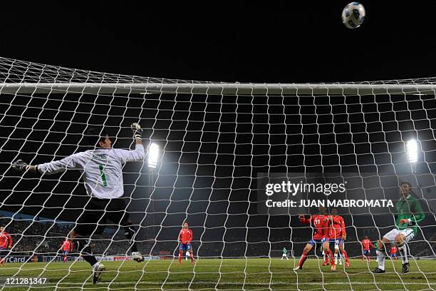 Bolivian goalkeeper Carlos Erwin Arias eyes the ball passing slightly over the crossbar during a 2011 Copa America Group A first round football match...