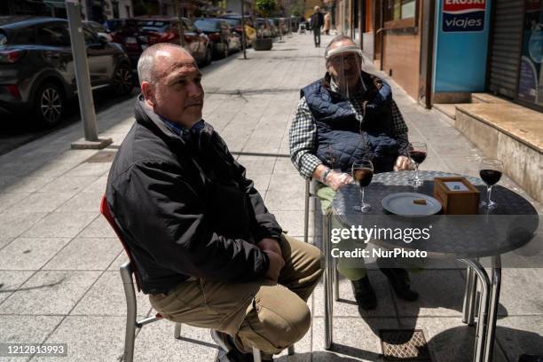 Wo people having a wine, on a terrace of a bar in Santander, Spain, on May 12 which with the arrival of phase 1 of de-escalation, can already open...