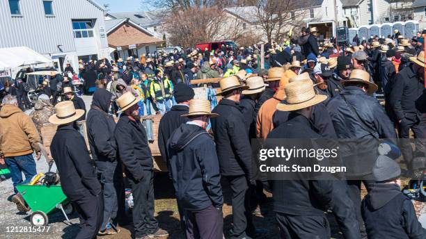 pennsylvania amish spring mud sales-3 - amish straw hat stock pictures, royalty-free photos & images