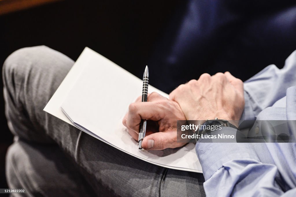 Man holding blank paper