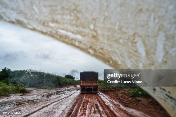 soy truck on bad road - mud truck stock pictures, royalty-free photos & images