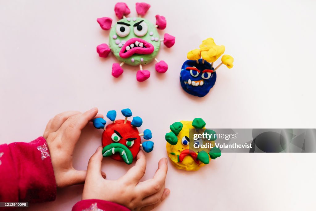 Kid handmade coronavirus ugly monsters made with plasticine