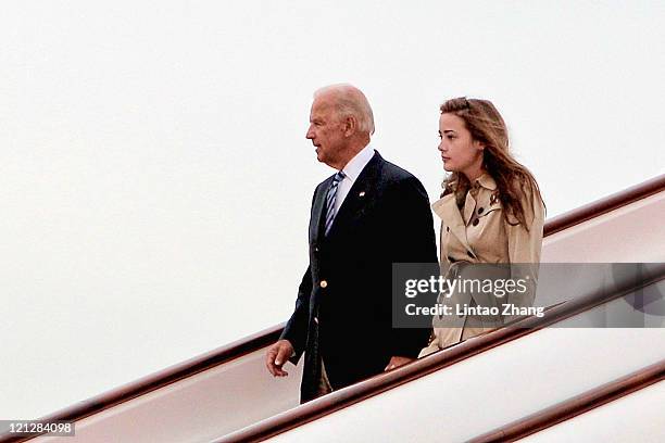 Vice President Joe Biden and his granddaughter Naomi Biden arrive at the Beijing Capital International Airport on August 17, 2011 in Beijing, China....