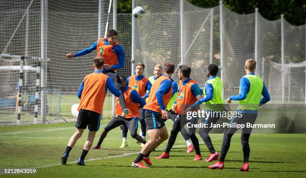 Marko Grujic of Hertha BSC heads the ball during the training on May 13, 2020 in Berlin, Germany.