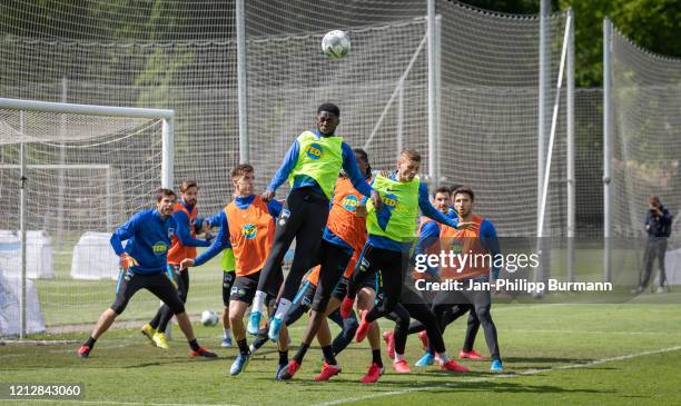 Jordan Torunarigha of Hertha BSC heads the ball during the training on May 13, 2020 in Berlin, Germany.